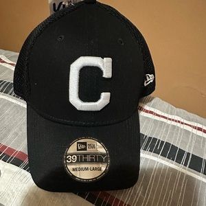 Men’s , New Era Cleveland Indians Team color black, size medium- large.